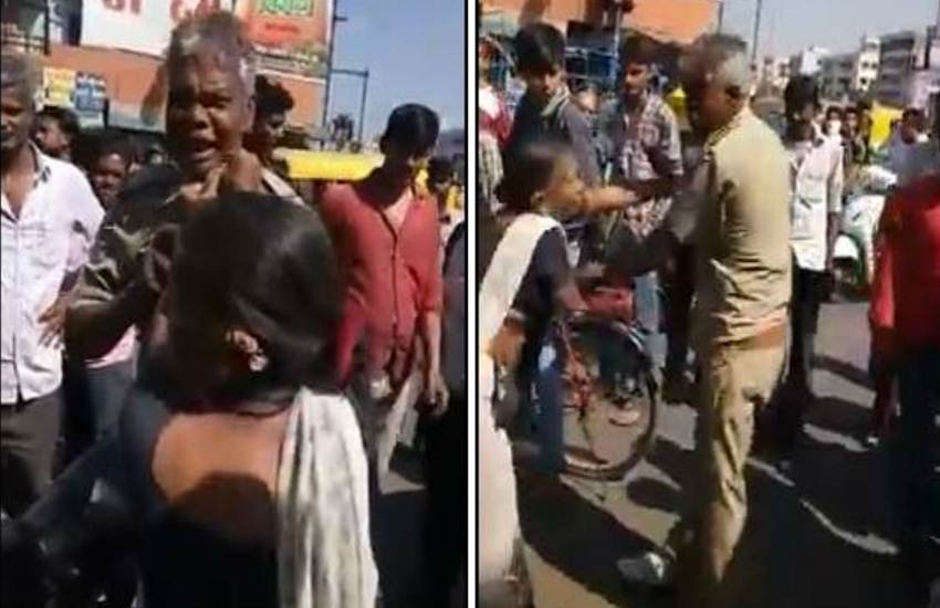 महिला ने की पुलिसवाले की पिटाई। (Photo Source: Videograb) महिला ने की पुलिसवाले की पिटाई। (Photo Source: Videograb)