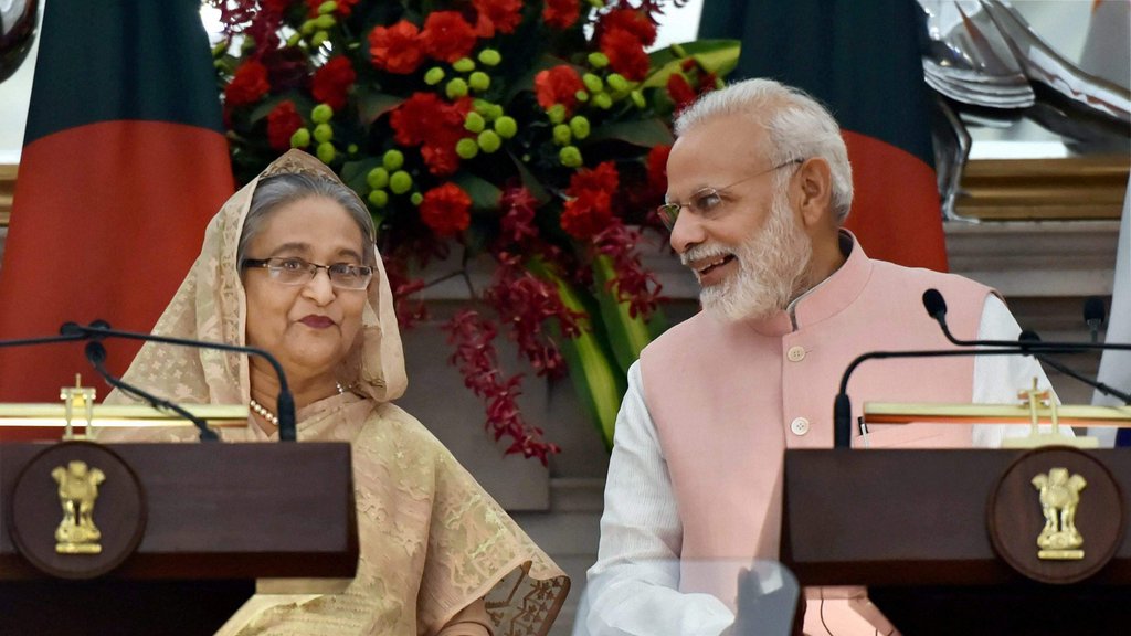 बांग्लादेश की पीएम शेख हसीना और भारतीय प्रधानमंत्री नरेंद्र मोदी।
 Source-ANI)