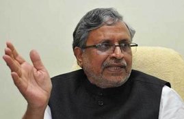 Sushil Modi, Tejaswi Yadav, Private Company, Checks Issued by Private Company, Deputy Chief Minister, Deputy Chief Minister Tnure, Tejaswi Yadav Releases Checks, Sushil Modi on Tejaswi Yadav, State news