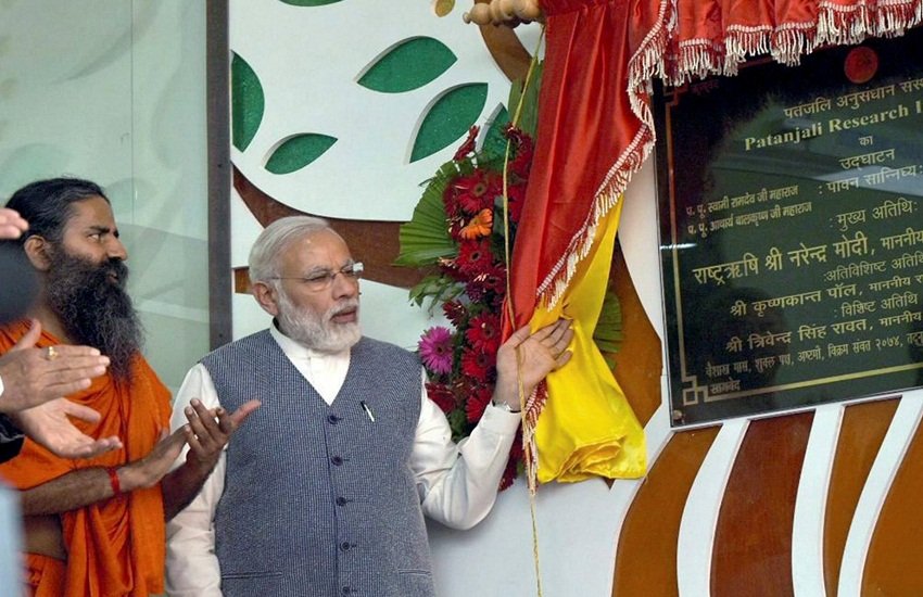 प्रधानमंत्री नरेंद्र मोदी के साथ बाबा रामदेव। (Source: PTI)