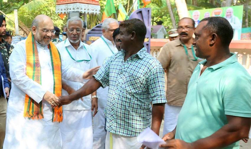 androth island shah,Madhya Pradesh,Lok Sabha,Amit Shah, BJP Door To Door campaign, BJP mass contact programme, Amit Shah, Amit Shah lunch At fisherman house
