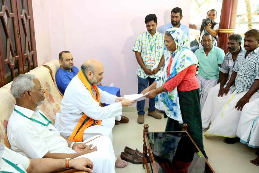androth island shah,Madhya Pradesh,Lok Sabha,Amit Shah, BJP Door To Door campaign, BJP mass contact programme, Amit Shah, Amit Shah lunch At fisherman house