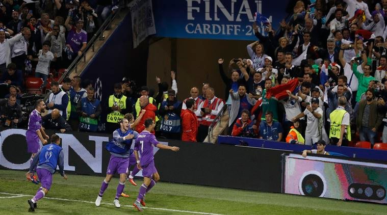 क्रिस्टियानो रोनाल्डो के दो गोल की मदद से रीयाल मैड्रिड शनिवार को कार्डिफ में युवेंटस को 4-1 से करारी शिकस्त देकर चैंपियन्स लीग युग में यूरोपीय कप फुटबाल का खिताब बरकरार रखने वाली पहली टीम बन गयी