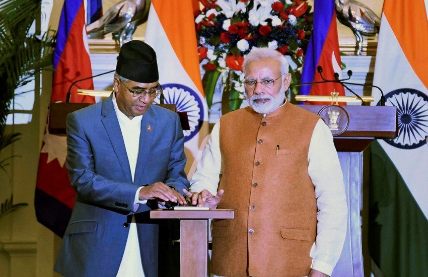 प्रधानमंत्री नरेन्द्र मोदी और नेपाल के प्रधानमंत्री शेर बहादुर देउबा के बीच रणनीति द्विपक्षीय तथा क्षेत्रीय मुद्दों पर विस्तृत चर्चा के बाद इन समझौतों पर हस्ताक्षर किए गए। (PTI) प्रधानमंत्री नरेन्द्र मोदी और नेपाल के प्रधानमंत्री शेर बहादुर देउबा के बीच रणनीति द्विपक्षीय तथा क्षेत्रीय मुद्दों पर विस्तृत चर्चा के बाद इन समझौतों पर हस्ताक्षर किए गए। (PTI)