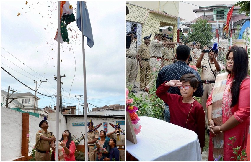 सीआरपीेएफ कैंप में तिरंगा फहराते और कमांडेंट प्रमोद कुमार को श्रद्धांजलि देती हुईं उनकी पत्नी नेहा त्रिपाठी और बेटी। (Source:PTI) 