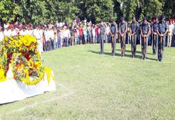 BSF and district police jawans giving salute to martyr Brijkishore