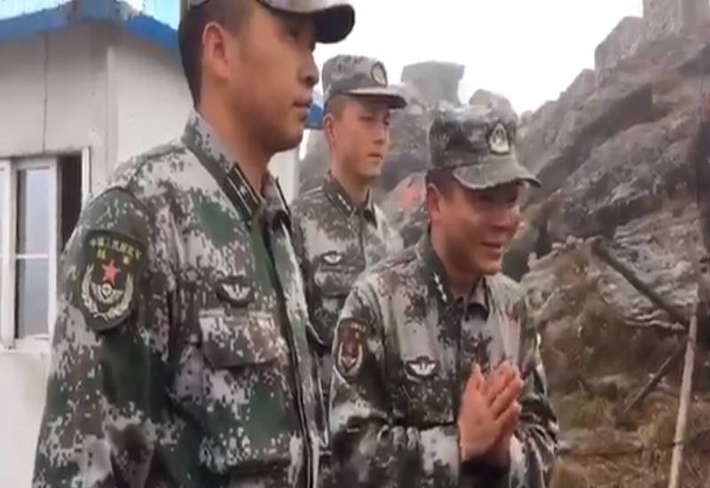 Chinese soldiers greeted by Nathala Sittaraman, joining hands with Nathula