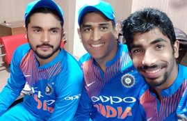 Jasprit Bumrah poses with MS Dhoni and Manish Pandey