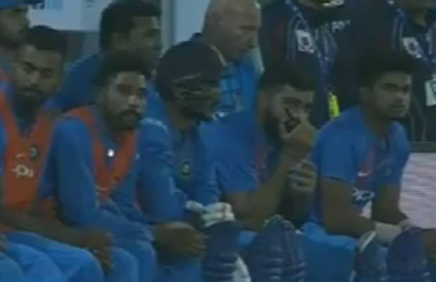 Virat Kohli, Virat Kohli Walkie Talkie, Virat Kohli breaks Law, Virat Kohli breaks ICC rule