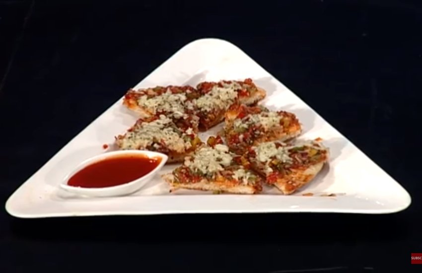 pizza, pizza dish, pizza dish in hindi, how to make pizza, how to make pizza at home, hpw to make pizza in hindi, cooker pizza, how to make cooker pizza, how to make cooker pizza in hindi, quick recipe in hindi, tasty recipe in hindi, lifestyle news in hindi, recipe in hindi, jansatta