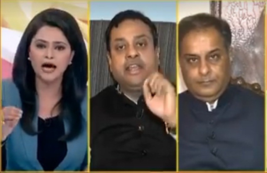 तस्वीर डिबेट शो के वीडियो का स्क्रीनशॉट है।