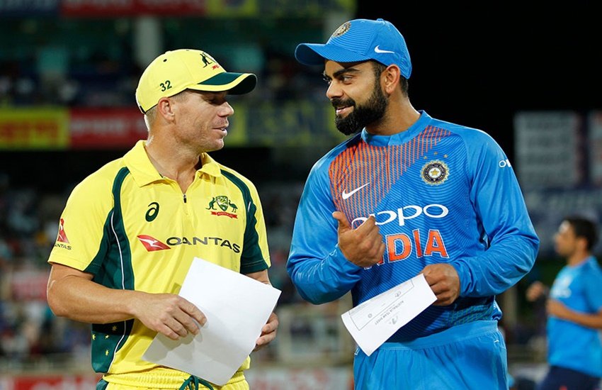 विराट कोहली के साथ डेविड वॉर्नर।