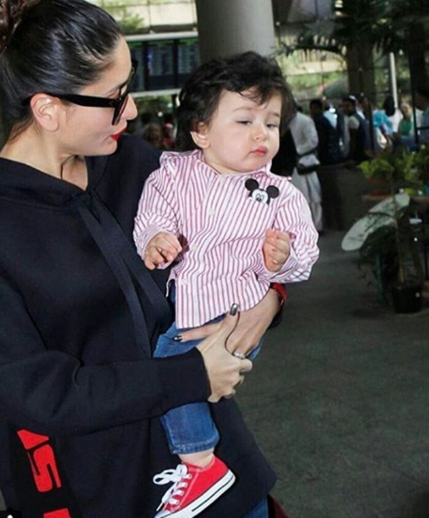 Taimur Ali Khan, Kareena Kapoor Khan, PHOTOS of Taimur Ali Khan, Taimur Ali Khan is back from Swiss vacation, Taimur Ali Khan seen with Mom, Taimur Ali Khan with Kareena Kapoor Khan, Taimur Ali Khan in mickey mouse shirt, entertainment news, bollywood news, television news in hindi, entertainment news