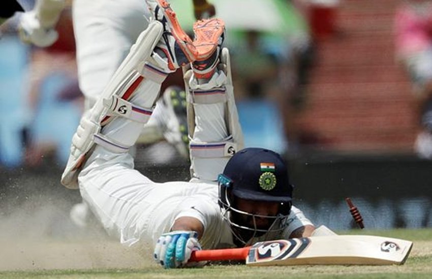 मेजबान टीम के तेज गेंदबाज लुंगी एंगिडी ने सीधा थ्रो करके चेतेश्वर पुजारा को रन आउट कर दिया। (फोटो सोर्स - एपी)