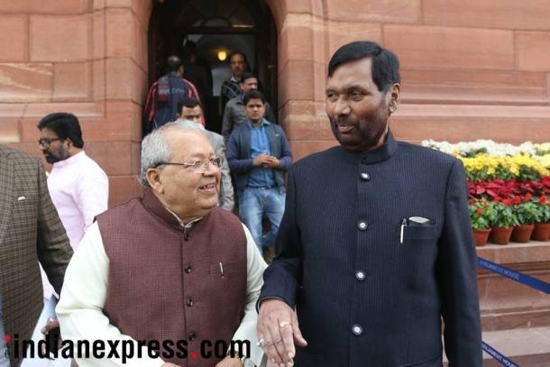 रामविलास पासवान और कलराज मिश्र संसद से बाहर आपस में बातचीत करते हुए। (Express Photo by Tashi Tobgyal)