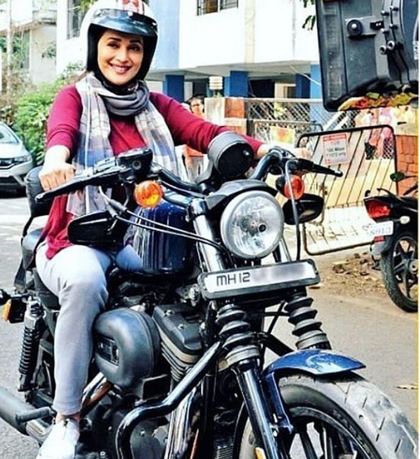 Madhuri Dixit, madhuri dancing and acting, Madhuri Dixit picking up new awtar, madhuri dixit as bike rider see pictures, bike rider Madhuri Dixit, biker Madhuri Dixit, bollywood news, televisison news, entertainment news, entertainment news, bollywood news, televisison news, entertainment news