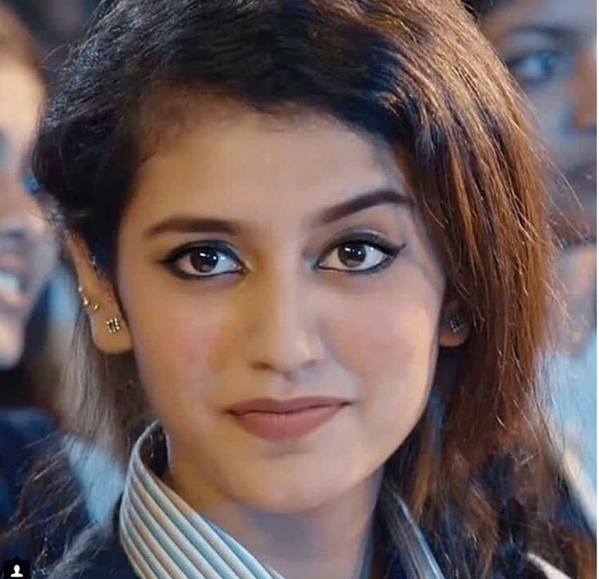 priya prakash varrier, video clip viral, social media, valentine week, valentine day, Oru Adaar Love, Manikya Malaraya Poovi, Malayalam movie, Manikya Malaraya Poovi Song, Vineeth Sreenivasan, Shaan Rahman