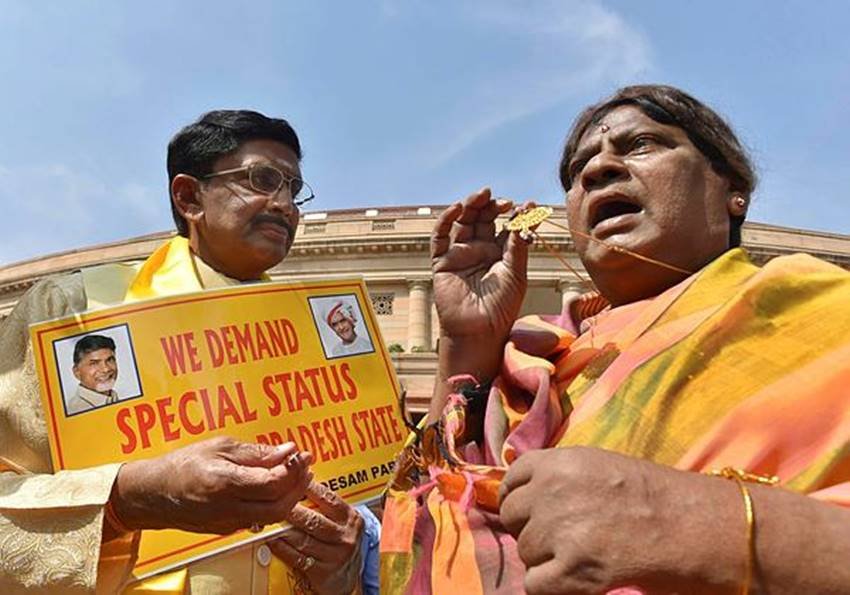 Naramalli Sivaprasad, Naramalli Sivaprasad pics, Naramalli Sivaprasad photos, Naramalli Sivaprasad protests, Naramalli Sivaprasad in parliamenrt, TDP MP Naramalli Sivaprasad, TDP MP Naramalli Sivaprasad protest, Special Status for Andhra Pradesh, Special Status for Andhra Pradesh protests, Special Status, Special Status for States, School Boy, School Boy dress, protest in Parliament premises, photo gallery
