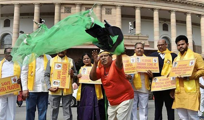Naramalli Sivaprasad, Naramalli Sivaprasad pics, Naramalli Sivaprasad photos, Naramalli Sivaprasad protests, Naramalli Sivaprasad in parliamenrt, TDP MP Naramalli Sivaprasad, TDP MP Naramalli Sivaprasad protest, Special Status for Andhra Pradesh, Special Status for Andhra Pradesh protests, Special Status, Special Status for States, School Boy, School Boy dress, protest in Parliament premises, photo gallery