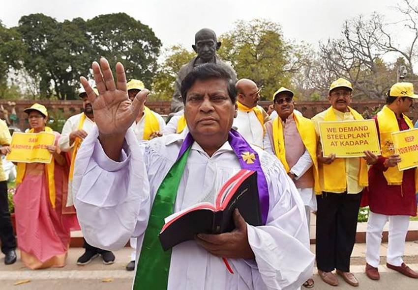 Naramalli Sivaprasad, Naramalli Sivaprasad pics, Naramalli Sivaprasad photos, Naramalli Sivaprasad protests, Naramalli Sivaprasad in parliamenrt, TDP MP Naramalli Sivaprasad, TDP MP Naramalli Sivaprasad protest, Special Status for Andhra Pradesh, Special Status for Andhra Pradesh protests, Special Status, Special Status for States, School Boy, School Boy dress, protest in Parliament premises, photo gallery
