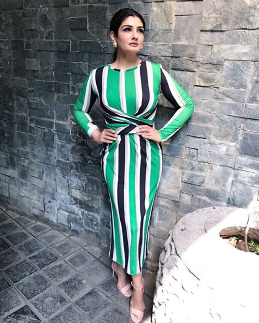 Raveena Tandon, Raveena Tandon fir, Raveena Tandon case, fir against Raveena Tandon, Raveena Tandon pics, Raveena Tandon photos, Raveena Tandon wallpapers, Raveena Tandon hot pics, Shooting An Advertisement, Sri Lingaraj Temple, Sri Lingaraj Temple shooting, photo gallery