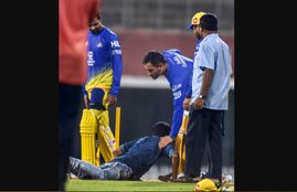Chennai Super Kings (CSK) skipper MS Dhoni gets blessing a fan near the pitch during the practice session of IPL, IPL, Chennai Super Kings, CSK, skipper MS Dhoni, skipper MS Dhoni news, cricket news,