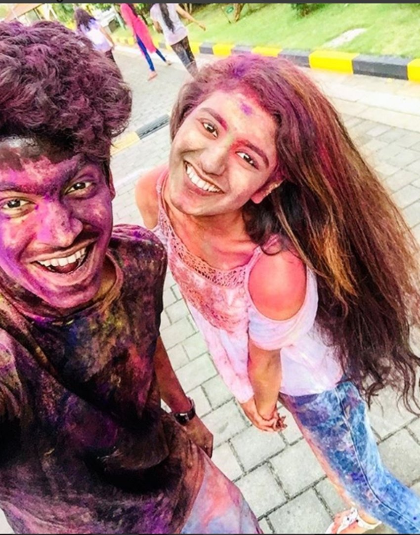 holi, holi 2018, happy holi, happy holi 2018, holi images, holi wishes, happy holi images, holi news, holi 2018 india, priya prakash varrier, roshan, umar lullu, oru adhar love