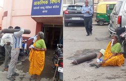 VIDEO: कंधे पर सिलेंडर और हाथ में यूरिन बैग लिए करता रहा इंतजार, बीमार मां को नहीं मिली एंबुलेंस