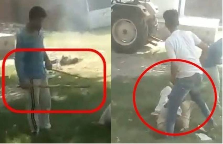 रस्सियों से बांधकर अपने ही पिता को पीटते हुए शख्स। (फोटोः टि्वटर)
