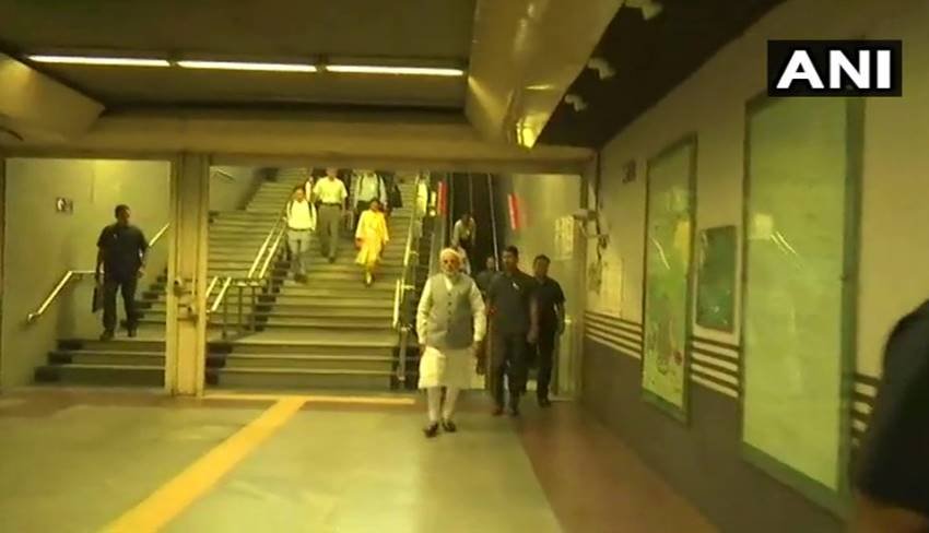 Narendra Modi, Narendra Modi in metro, Narendra Modi in delhi metro, Narendra Modi metro pics, Narendra Modi metro photos, Narendra Modi metro picutres, selfie with modi, selfie with modi in metro, selfie with modi in delhi, selfie with modi in delhi metro, Prime Minister Narendra Modi, Prime Minister Narendra Modi in metro, photo gallery