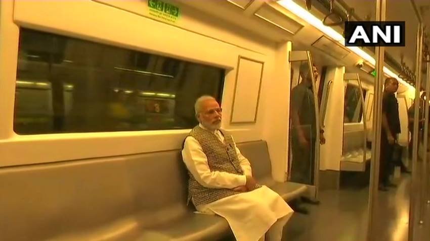 Narendra Modi, Narendra Modi in metro, Narendra Modi in delhi metro, Narendra Modi metro pics, Narendra Modi metro photos, Narendra Modi metro picutres, selfie with modi, selfie with modi in metro, selfie with modi in delhi, selfie with modi in delhi metro, Prime Minister Narendra Modi, Prime Minister Narendra Modi in metro, photo gallery
