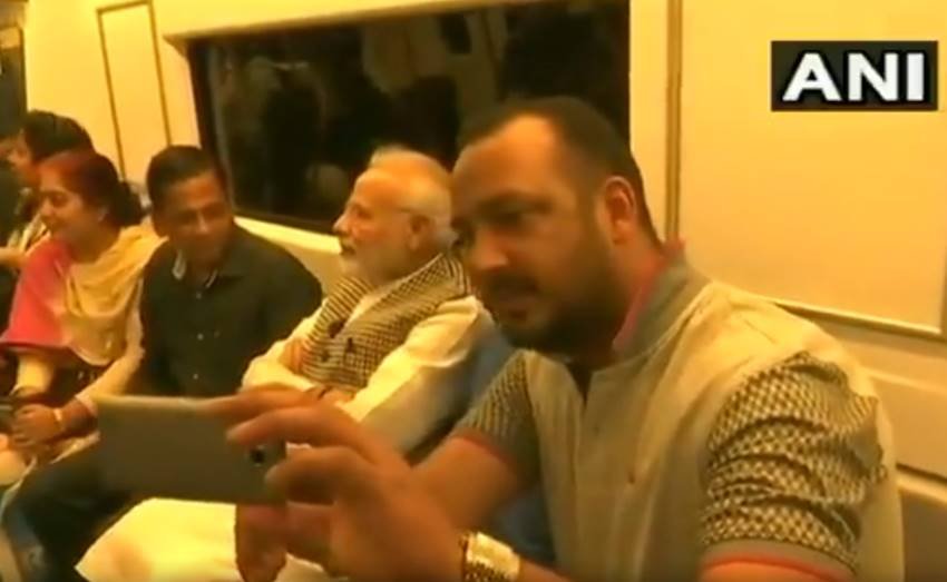 Narendra Modi, Narendra Modi in metro, Narendra Modi in delhi metro, Narendra Modi metro pics, Narendra Modi metro photos, Narendra Modi metro picutres, selfie with modi, selfie with modi in metro, selfie with modi in delhi, selfie with modi in delhi metro, Prime Minister Narendra Modi, Prime Minister Narendra Modi in metro, photo gallery