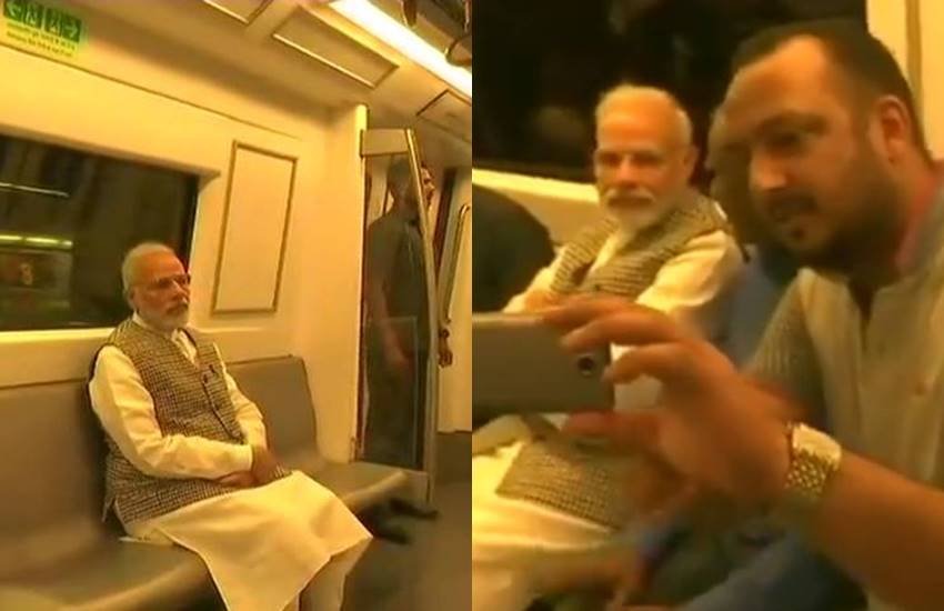 Narendra Modi, Narendra Modi in metro, Narendra Modi in delhi metro, Narendra Modi metro pics, Narendra Modi metro photos, Narendra Modi metro picutres, selfie with modi, selfie with modi in metro, selfie with modi in delhi, selfie with modi in delhi metro, Prime Minister Narendra Modi, Prime Minister Narendra Modi in metro, photo gallery
