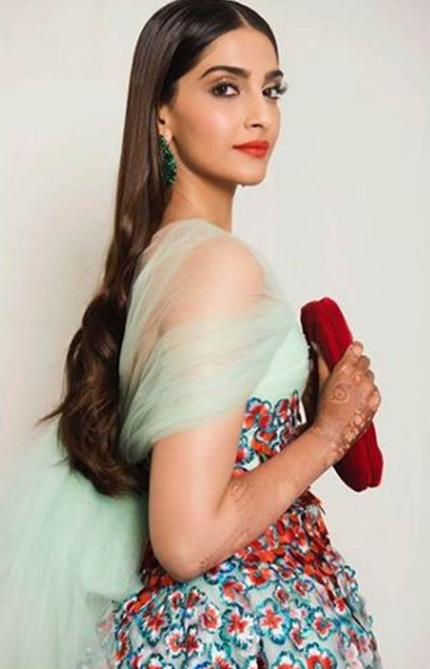 cannes 2018: sonam kapoor, sonam kapoor reaches at red carpet of cannes, sonam in cannes 2018, sonam looks bride with mehandi at cannes, sonam with mehandi on her hands, sonam wore cream eligent lehanga, see pictures of sonam kapoor in cannes film festival, sonam kapoor at cannes film festival, entertainment news, bollywood news, television news