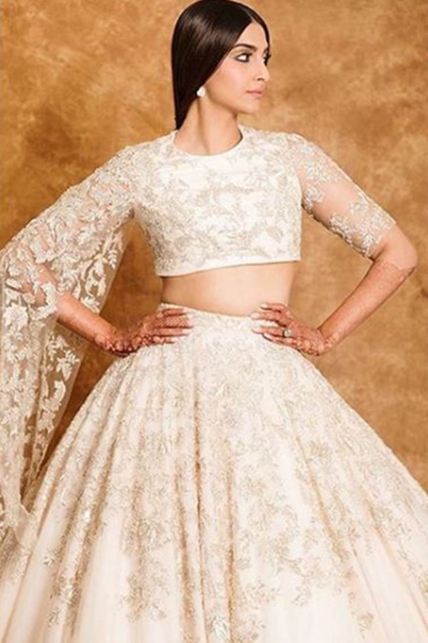 cannes 2018: sonam kapoor, sonam kapoor reaches at red carpet of cannes, sonam in cannes 2018, sonam looks bride with mehandi at cannes, sonam with mehandi on her hands, sonam wore cream eligent lehanga, see pictures of sonam kapoor in cannes film festival, sonam kapoor at cannes film festival, entertainment news, bollywood news, television news