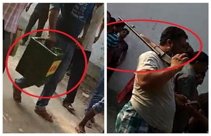 पश्चिम बंगाल के पंचायत चुनाव में खुलेआम हथियार लहराकर, वोटरों को धमकाकर बैलेट बॉक्‍स लूटकर जाते गुंडे। फोटो- ANI 