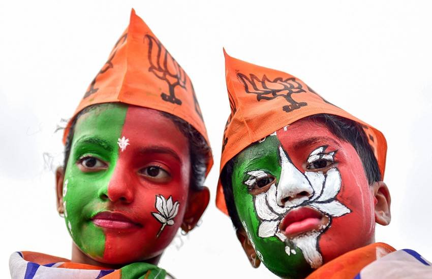 प्रधानमंत्री नरेंद्र मोदी की रैली में आए बच्‍चे। (Photo: PTI)