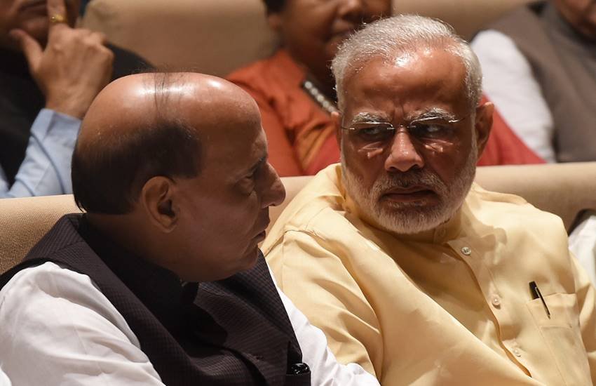 गृह मंत्री राजनाथ सिंह और पीएम नरेंद्र मोदी की फाइल फोटो। (सोर्स- पीटीआई)