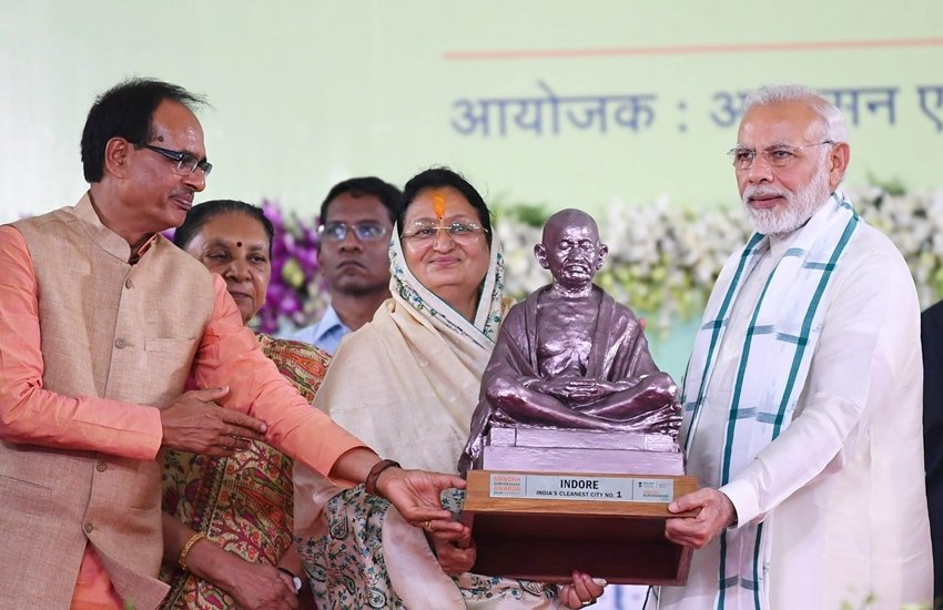 मध्य प्रदेश के मुख्यमंत्री शिवराज सिंह चौहान और पीएम मोदी (पीटीआई फोटो)