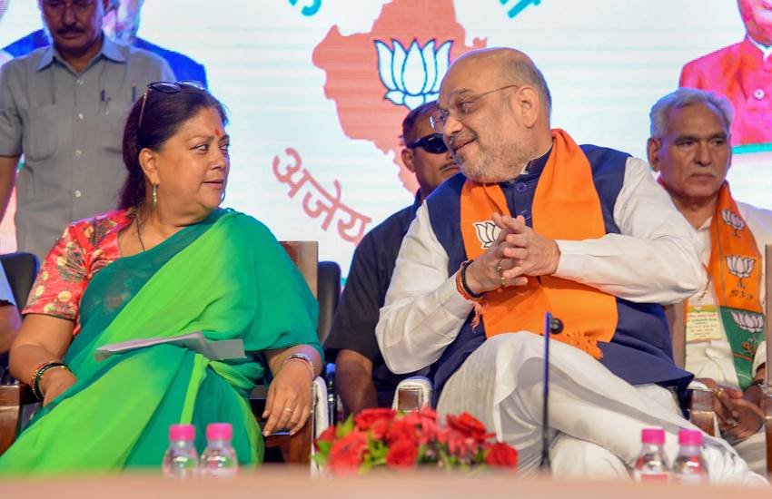 भाजपा कार्यसमिति की बैठक के दौरान पार्टी अध्‍यक्ष अमित शाह और राजस्‍थान की मुख्‍यमंत्री वसुंधरा राजे। (Photo : PTI)