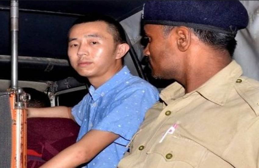 पुलिस गिरफ्त में चीनी नागरिक (फाइल फोटो)