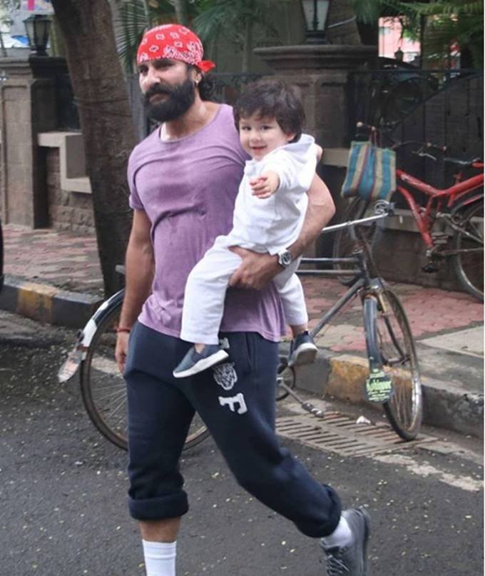 photos of taimur ali khan, taimur ali khan pictures, saif ali khan with son taimur, taimur flaged tricolour, taimur fun with joyfull smile, entertainment news, bollywood news, television news, entertainment news, bollywood news, television news, entertainment news, bollywood news, television news