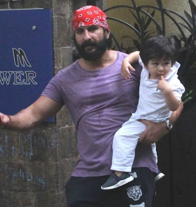 photos of taimur ali khan, taimur ali khan pictures, saif ali khan with son taimur, taimur flaged tricolour, taimur fun with joyfull smile, entertainment news, bollywood news, television news, entertainment news, bollywood news, television news, entertainment news, bollywood news, television news