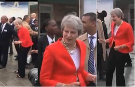 Theresa May, Prime Minister, British PM, Britain, Dance, Dance Video, Viral Video, Laugh, Kids, School Kids, Officers, Mkize Senior Secondary School, Cape Town, South Africa, Foreign Tour, International News, Trending News, Hindi News