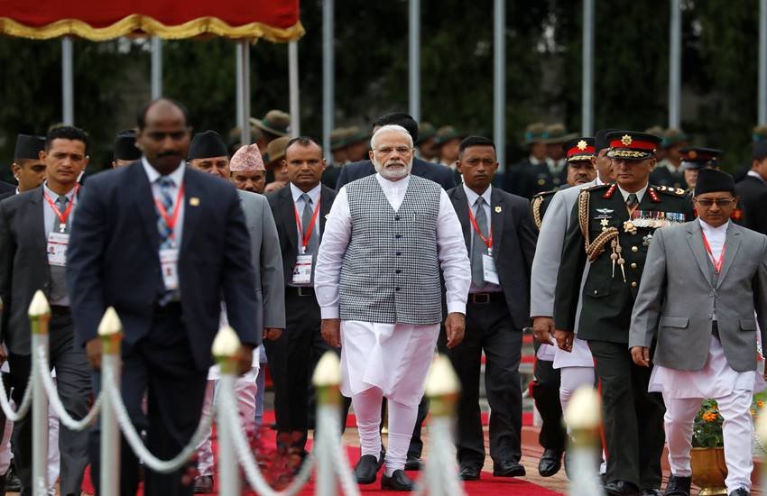 प्रधानमंत्री नरेन्द्र मोदी बिम्स्टेक शिखर सम्मेलन की बैठक में हिस्सा लेने गुरुवार को काठमांडो पहुंचे। इस बैठक में सदस्य देशों के बीच आतंकवाद सहित सुरक्षा के विविध आयाम, मादक पदार्थो की तस्करी, साइबर अपराध, प्राकृतिक आपदा के अलावा कारोबार एवं सम्पर्क से जुड़े विषयों पर चर्चा होगी और आपसी सहयोग मजबूत बनाने पर जोर दिया जायेगा । (Photo-Reuters) 