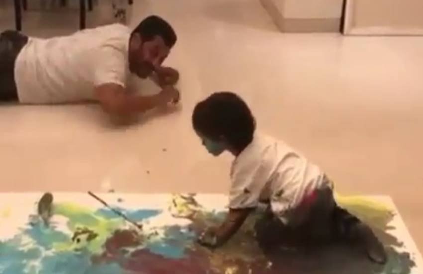 Salman Khan, salman khan having fun on sunday, salman khan sunday funday with ahil, salman with arpita son ahil, here is how mamu salman khan playing with colours, salman teaching painting to ahil, ahil with salman khan video, salman teaching painting video, entertainment news, bollywood news, television news, entertainment news, bollywood news