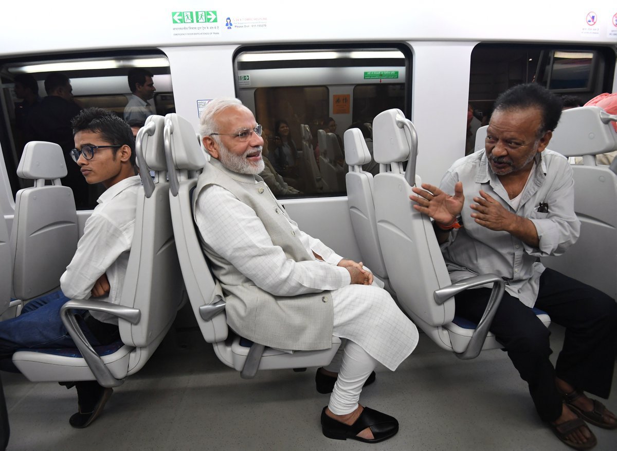 narendra modi metro ride, pm modi in delhi metro, delhi metro express line, dhaula kuan to dwarka metro, IICC foundation
