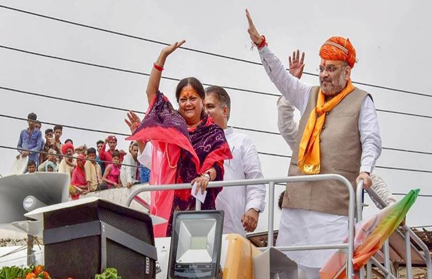 'सूरज गौरव यात्रा' के दौरान भाजपा अध्यक्ष अमित शाह और राजस्थान की मुख्यमंत्री वसुंधरा राजे (पीटीआई- फाइल फोटो)