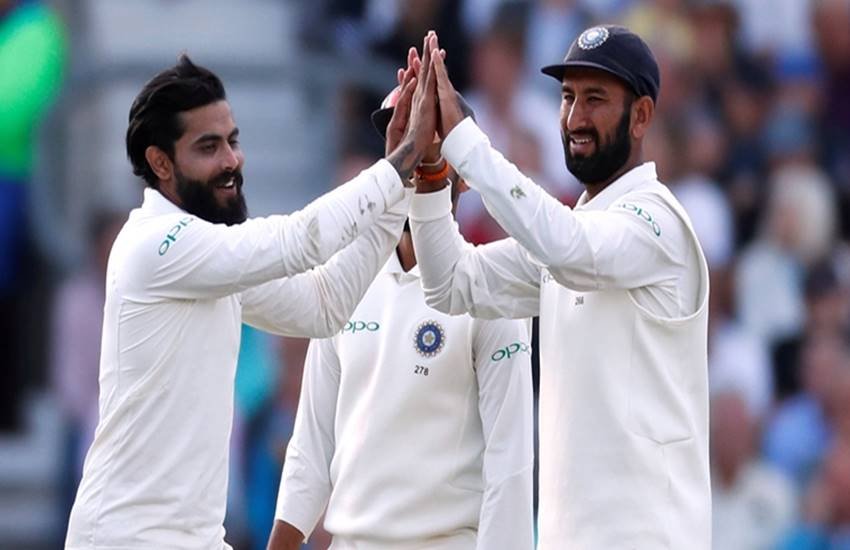 रविंद्र जडेजा और चेतेश्वर पुजारा। . (Source: Reuters)