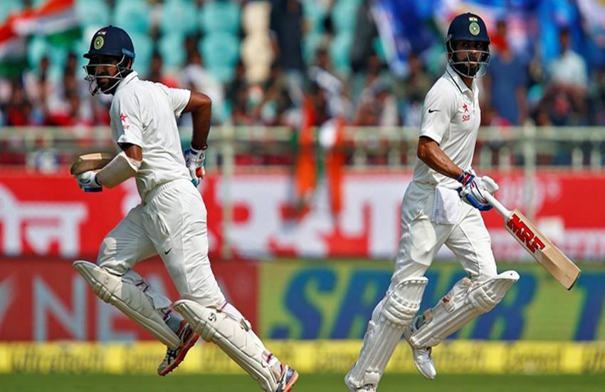 चेतेश्वर पुजारा और विराट कोहली। (Source: Reuters)